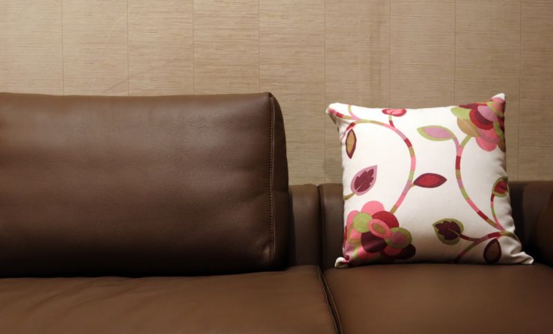 cheap-couches-for-sale-floral-pillow-min