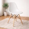 white plastic dining chair with wooden legs
