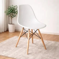 white plastic dining chair with wooden legs