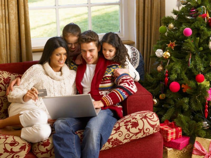 corner-couches-for-sale-hispanic-family-at-home-at-christmas-20466491-min