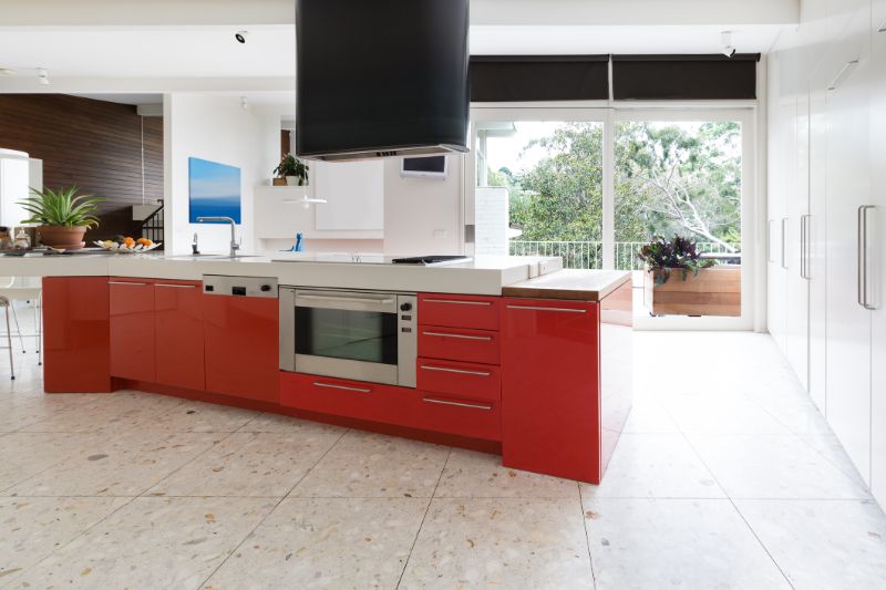 kitchen-cupboards-for-sale-orange-red-kitchen-cabinets-in-island-bench-in-modern-luxury-australian-home--min